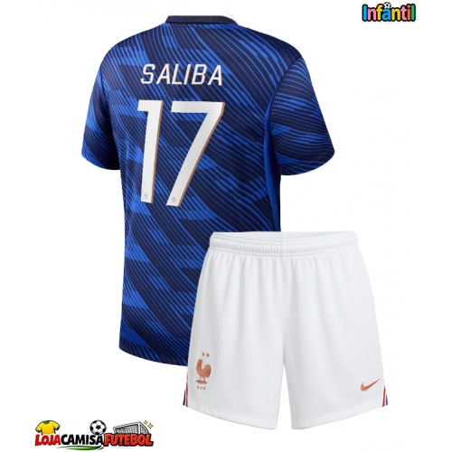 Camisa de Futebol França William Saliba #17 Equipamento Principal Infantil Mundo 2026 Manga Curta (+ Calças curtas)